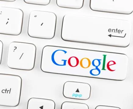 Google logotype on a keyboard button Stock Photos