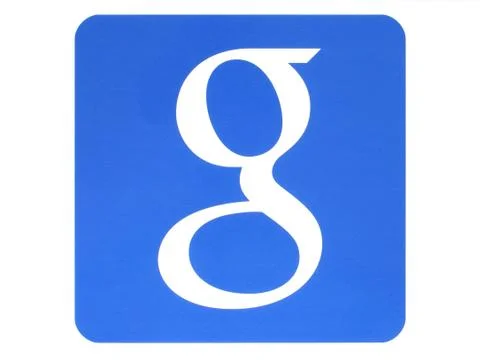Google logotype printed on paper on white background Foto stock