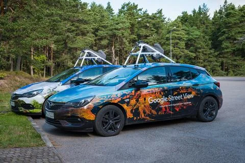 Google map vehicles are mapping roads worldwide. Stock Photos