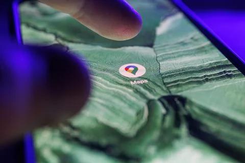 Google maps app on smartphone screen. Close up shot of google maps app Stock Photos