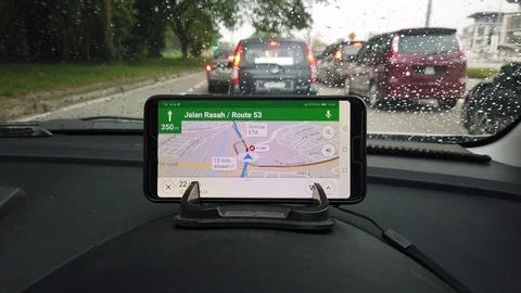 Google maps application on smart phone Stock Footage 106435276