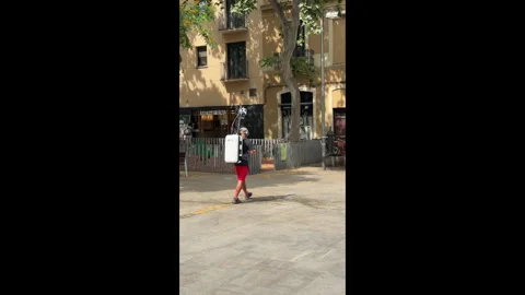 Google Maps filmer walks around Barcelona with a camera rig on his back. Spain. Stock Footage 340455891