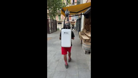 Google Maps filmer walks around Barcelona with a camera rig on his back. Spain. Stock Footage 340456109