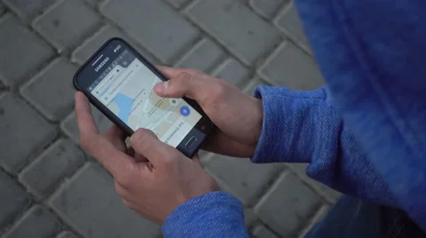 Google Maps On Mobile Cell Phone - Man looking searching New York Stock Footage