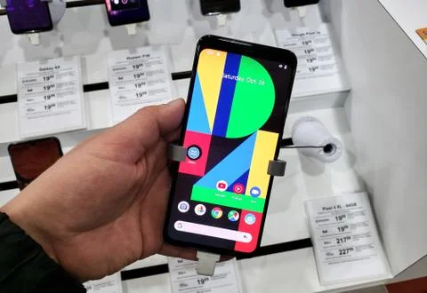 Google Pixel 4 phone in a hand Photos