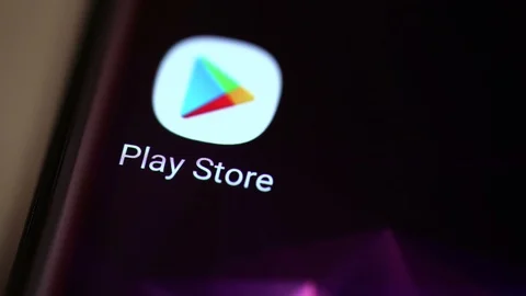 Google Play Store icon on a smartphone 動画素材 107878862
