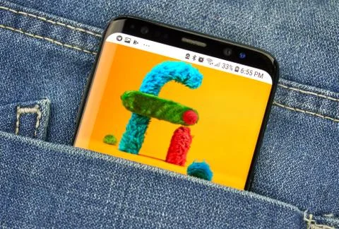 Google Project Fi on a phone screen in a pocket Stockfoto's