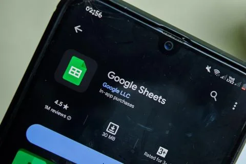 Google Sheets application on Smartphone screen. Google Sheets Stock Photos