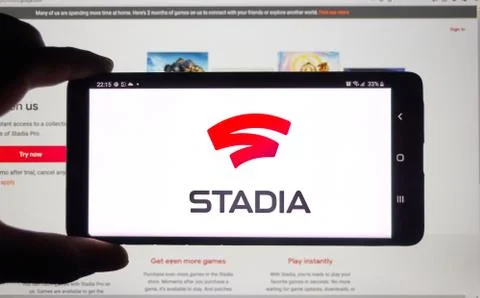 Google Stadia logo on a screen. Stadia offers 2 free months of subscription. Stock Photos