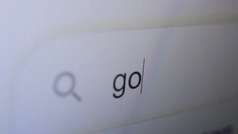 Google text browse on the search bar of the monitor screen. browse google Video stock 204798625