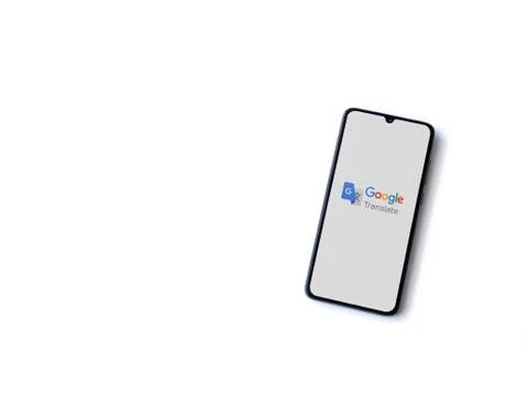 Google Translate app launch screen with logo on the display of a black mobile Stock Photos