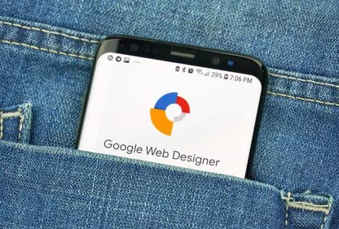 Google Web Designer on a phone screen in a pocket Stock Photos