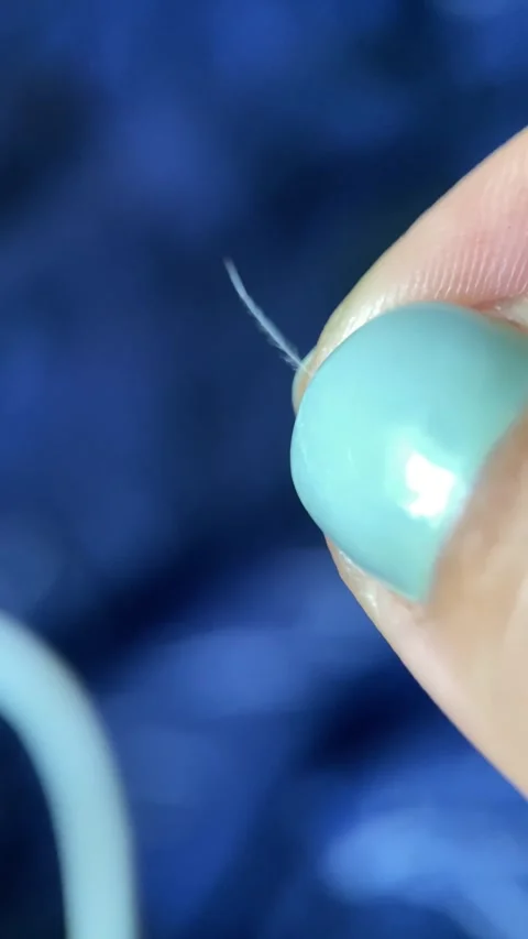 Goose down close-up, macro, filling of winter warm jackets, sleeping bags, insul Stock Footage 256746802