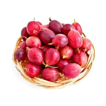 Gooseberries in a wicker plate Stock Photos