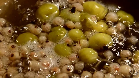 Gooseberry and white currant compote Stock Footage 328640434