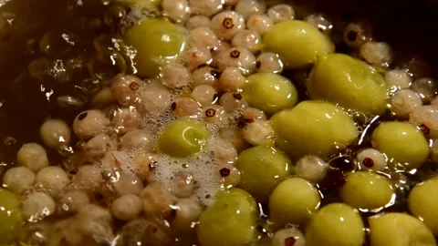 Gooseberry and white currant compote Stock Footage 328640466
