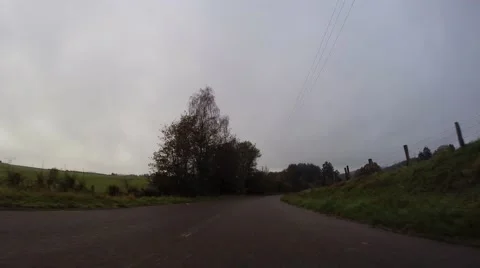 Gopro attached to bumper driving through countryside Stock Footage 43240573