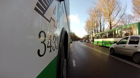 Gopro attached to the bus, moving through streets 3 Stock Footage 48336464