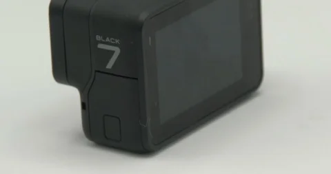 GoPro Black 7 Rotating on White Background - Camera Stock Footage 127869324
