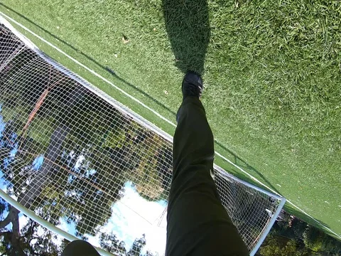 GoPro Chesty first person view rolling through a soccer field. Stock-Footage 127610358