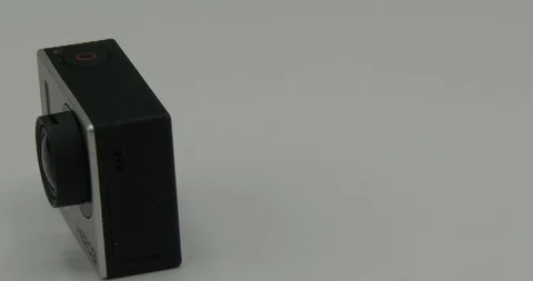 GoPro Hero3 Rotating on White Background Stock Footage 127869222