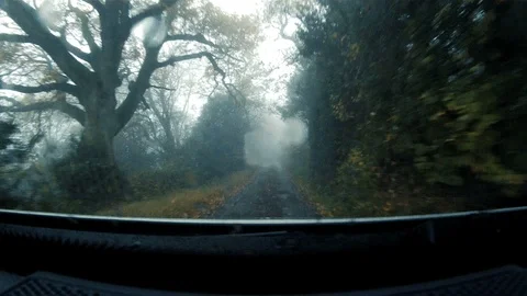 GoPro shot from dash of fast moving 4x4 along British country lane 2 Stock Footage 117862810