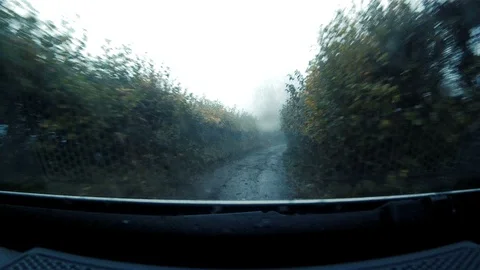 GoPro shot from dash of fast moving 4x4 along British country lane 3 Stock Footage 117862896