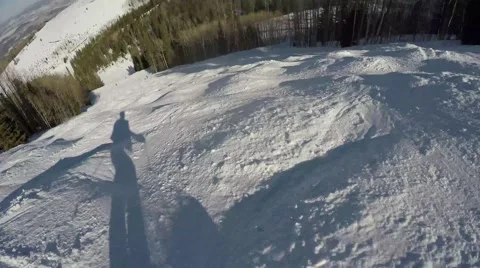 GoPro skier's shadow going down moguls POV UGC Park City Utah USA Stock Footage 61863637