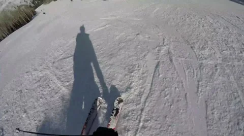 GoPro skier's shadow going down moguls Stock Video Pond5