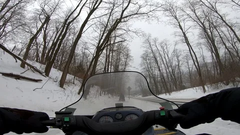 GoPro Snowmobiling Along a Road Stock-Footage 102536106