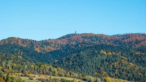 Gorce mountain range. Mountains in autumn. Wooden observation tower on Moun.. Stock Photos