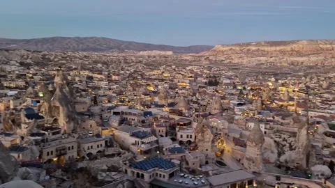 Göreme at night with a sweeping pan capturing the town's illuminated charm. Stock Footage 262887515