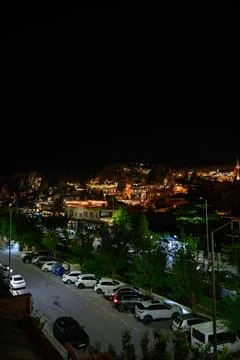 GOREME, TURKEY- JUNE 9, 2025: Night view of illuminated cave hotels, street Stock Photos