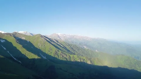 A gorge between mountain peaks and hills Video stock 247858064