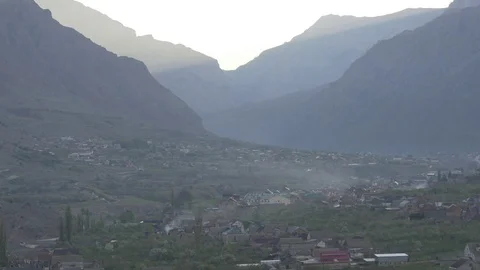 Gorge with a mountain settlement Stock Footage 75496276