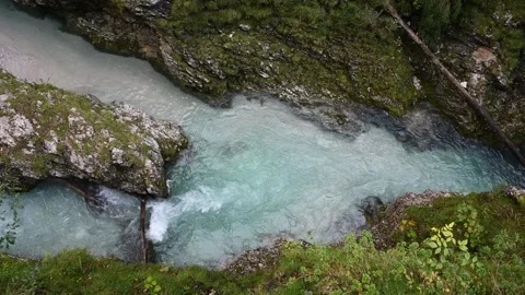 A gorge with rocks in the middle of a mountain stream  Video stock 260867951