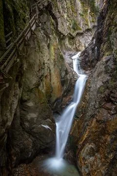 A gorge with a waterfall at the edge is a staircase 写真素材