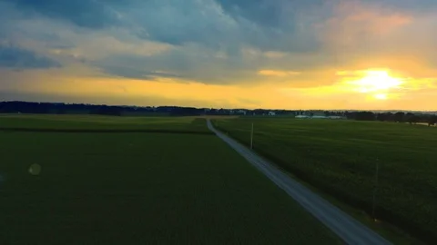 Gorgeous Aerial Sunset Over Cornfields and Farms Slow Motion Stock Footage 112682283