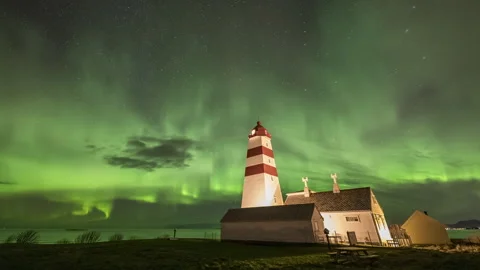Gorgeous Aurora Borealis with lighthouse tower Stock Footage 250796415