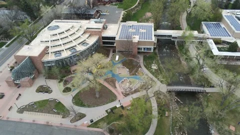 Gorgeous Boulder Library - Drone moves around to show the building and river Stock Footage 138877847
