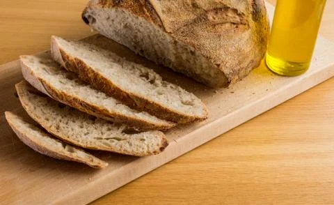 Gorgeous breakfast with handmade bread and olive oil Stock Photos