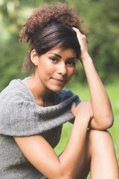 Gorgeous brunette smiling at camera Fotos de archivo