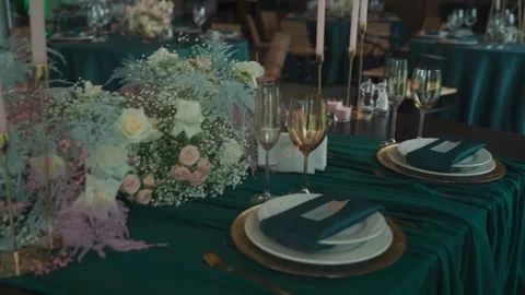 Gorgeous decorating of wedding table with flowers. Stock Footage 134824745