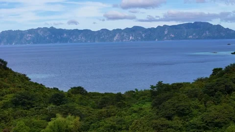 Gorgeous drone shot of Coco Beach, highlighting its scenic beauty and peaceful Stock Footage 295914775