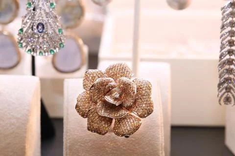 Gorgeous expensive ring in the form of a flower with diamonds Stock Photos