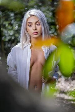 Gorgeous Implied Nude Blonde Model Enjoying A Day Near The Beach Stock Photos