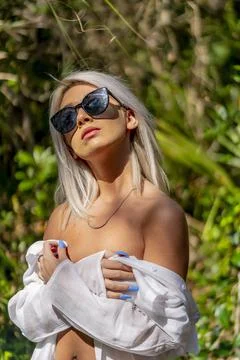 Gorgeous Implied Nude Blonde Model Enjoying A Day Near The Beach Stock Photos
