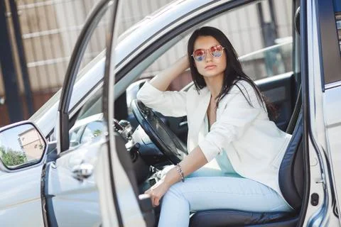 Gorgeous lady in fansy car Stock Photos