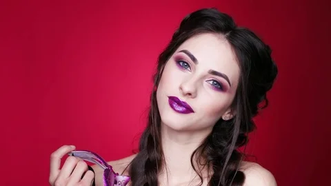 Gorgeous model with glamorous make-up in carnival glasses Stock Footage 77732290