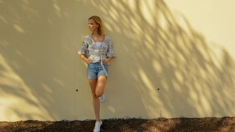 Gorgeous model leaning on wall 스톡 동영상 107604775